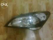 Kia Ceed 921011H070 фара левая