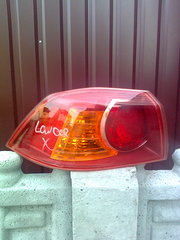 Продам задний наружний стоп мицубиси лансер Х 2008г.